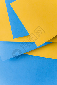 边缘解析和高品质的美丽照片堆叠黄色蓝纸背景高质量美容照片概念高品质的漂亮照片形象构想ACONF1986明亮的白色背景图片