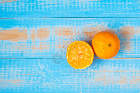 高的木桌背景上红橘子富含维生素C和高抗氧化剂有机水果和食品健康概念丰盛的维生素C和高抗氧化剂普通话美味的背景图片