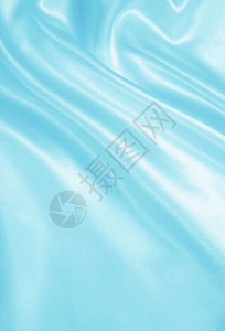 海洋采用美丽的平滑优雅蓝色丝绸或可用作背景图片