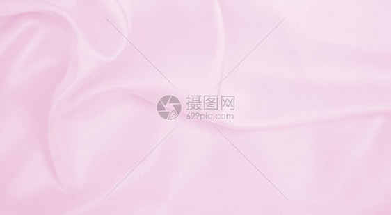 时尚平滑优雅的粉色丝绸或派文纹理可用作婚礼背景材料美丽的丰富多彩图片