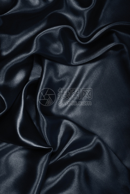 平滑优雅的黑色丝绸或可用作背景银色自然织物图片