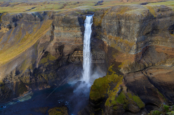 冰岛的海弗斯瀑布冰岛最高的瀑布之一广受欢迎的旅游景点和美丽的色徒步旅行海佛斯摄影图片