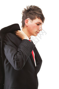 诱惑时尚经理装年轻商人黑西在孤立的白色背景下随身穿红领带图片