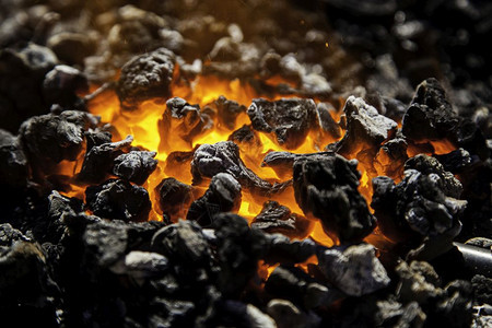 力量煤炭中的红热碳做饭火细节发光的黄色图片