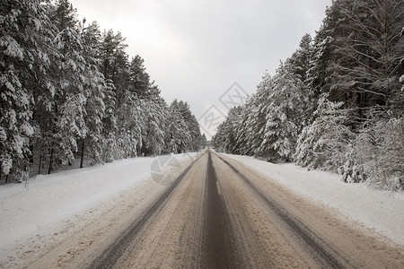 冰痕路线打印在雪地上有汽车的踪迹雪地上痕车道背景