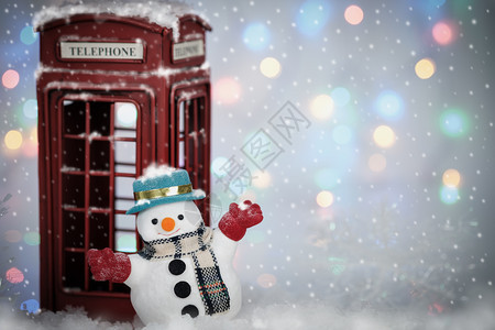新的雪人打在瀑上电话盒附近放雪复制时间空圣诞快乐AF点选择和制作雪花装饰品微笑图片
