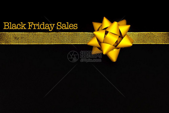 季节黑色星期五销售黑色背景的金弓标签市场图片