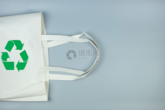 棉布海洋变暖灰色背景的生态购物袋带有复制空间用于文本环境保护零废物可再使用不塑料世界环境日地球概念等文字图片