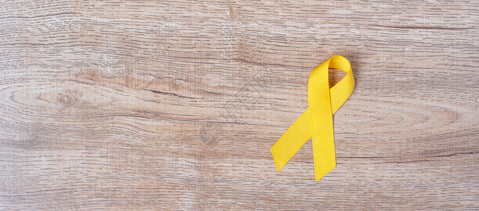 癌症日概念的黄丝带健康护理和世界癌症日概念世界癌症日概念设计图片