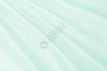 银色液体平滑优雅的绿色丝绸或席边奢华布质料可用作抽象背景豪华设计光滑的图片