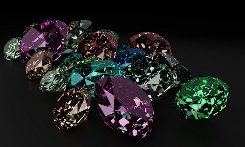 宝贵的黑底一堆多彩钻石3D结礼物图片