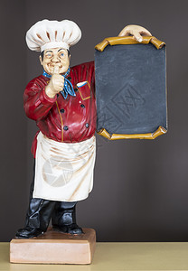 食谱餐巾带海报穿戴典型厨服的木制装饰烹饪茶壶图片