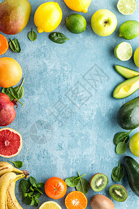 最佳石榴不同选择的多汁有机热带水果超食物健康饮概念文字空白框格的顶部视图酸橙图片