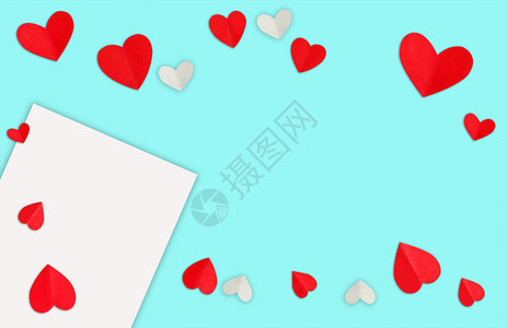 二月手工制作的情人节背景情人节概念红心在面贴蓝本背景空间上情人节礼物图片
