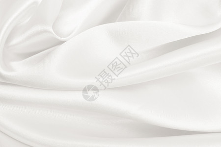 精美的平滑优雅金丝绸或席边奢华布质料可用作婚礼背景彩色设计用在SepiatonedRetro风格上颜色金的背景图片