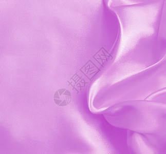 粉色的纺织品平滑优雅的粉色丝绸或纹质可用作背景有感的图片