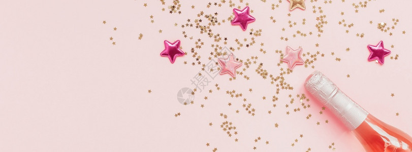 彩色星星与粉色香槟图片
