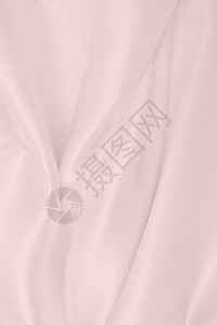 平滑优雅的粉色丝绸或派文纹理可用作婚礼背景彩日情人节背景设计光滑的布料银色图片