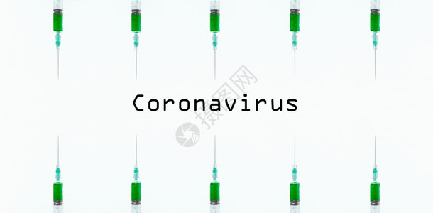 2019新型冠状一种蓝底注射针筒中的绿色液体冠状保护概念全景图像治愈图片