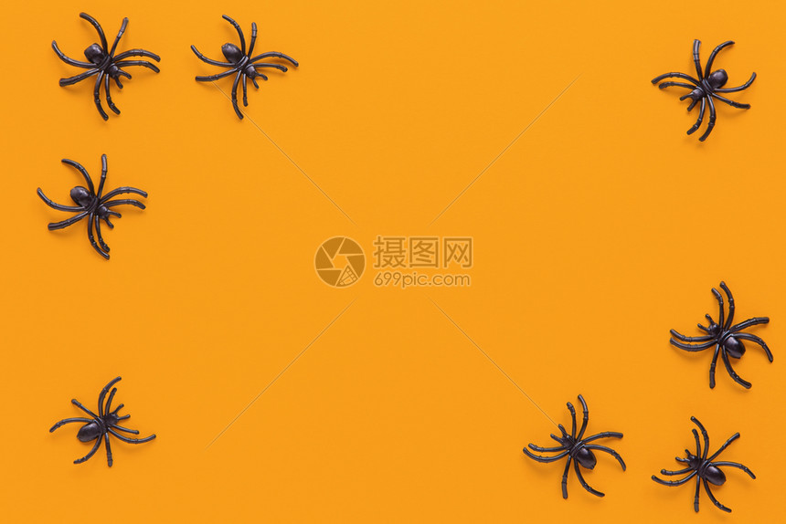灯笼万圣节假日公寓将黑蜘蛛放在橙色背景上复制空间最微小的风格水平特技或治疗概念秋天躺着图片