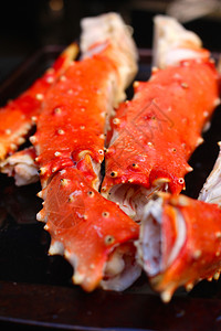 辣椒螃蟹烤混合的海鲜加龙虾平静鱼蓝面圈和大虾健康自然晚餐背景