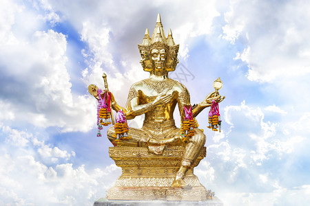 佛教金色的布拉马神像蓝色天空白的旋翼风云深处的泰王国印度图片