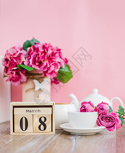 信息Womenrsquos日3月8日树历国际Womenrsquos日在粉红色的背景上装饰着粉红色和紫的花朵早上好喝杯茶或咖啡假期图片
