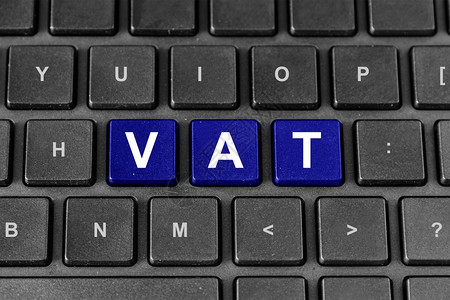 工资数据键盘上的Vat或增值税字词业务概念税负过重图片