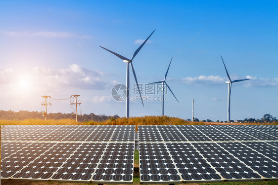 户外力量太阳能电池板与风力涡轮机对抗山景与蓝天云替代能源概念清洁绿色细胞图片