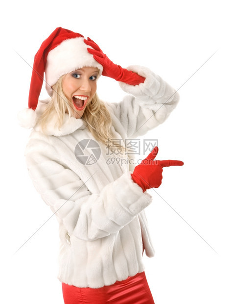 微笑诺维科夫套装扮成圣诞老人的感女孩将手指向广告空间图片