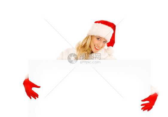 扮成圣诞老人的感女孩将手指向广告空间复制白种人庆祝活动图片