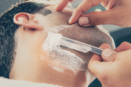 肥皂男人在理发店刮胡子男人在理发店刮胡子奏鸣曲剃刀图片