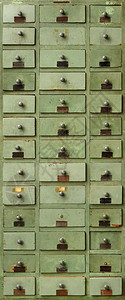 染色陈年内阁背景和质地非常旧的带抽屉绿色木柜带抽屉的旧绿色木柜图片