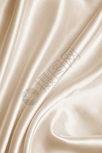纺织品光滑的平优雅金丝绸可以用作婚礼背景在SepiatonedRetro风格下棕褐色图片