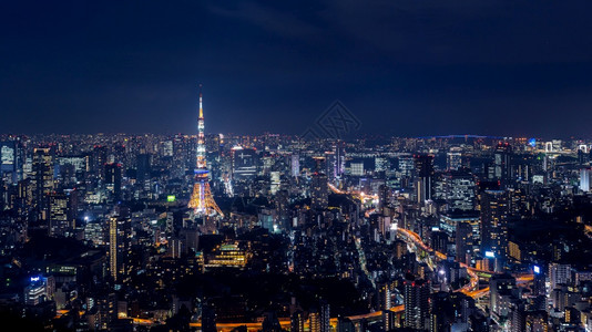 发光的都会日本东京夜市风景日落图片