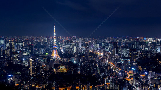 发光的都会日本东京夜市风景日落图片