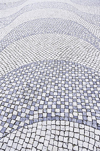 摊铺机典型石板楼层里斯本带有形状和图画的典型地板细节葡萄牙艺术旅游水平的路面图片