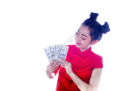 泰国账单下巴白种背景持有10美元钞票的亚洲女红衣孩新年概念妇女新年图片