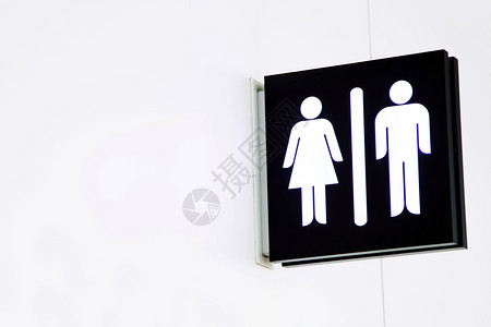 女一种先生们在白墙背景的洗手间上设置男女用WC标志供在白墙背景上的洗手间使用留下空间撰写信息图片