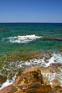 海岸溅起沿旅游和节假日的夏季背景希腊克里特惊人在海滩上的风景希腊雪地奇异图片