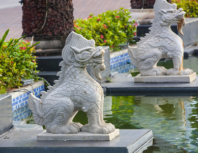 亚洲古老的胡须海南岛三亚的狮子雕塑图片