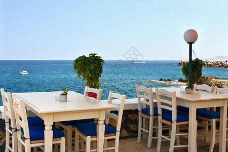 建造一张希腊酒馆的封面桌和一份旅行节假日的夏季背景材料希腊语夏天图片