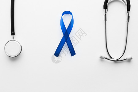 蓝色丝带与听诊器背景图片