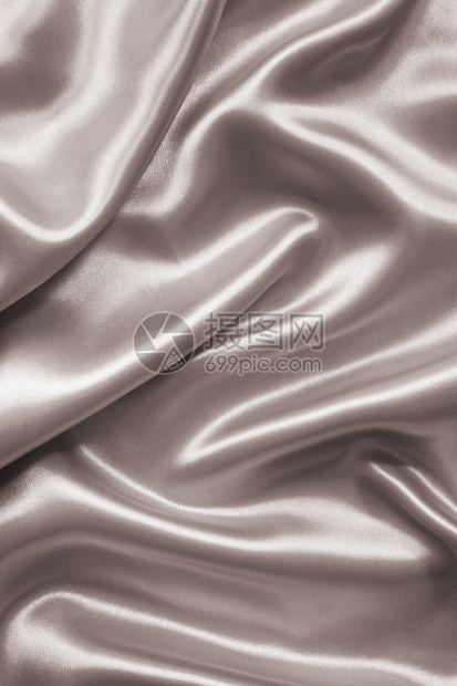 柔软的在SepiatonedRetro风格中平滑优雅的棕色丝绸或可以用作背景光滑的采用图片