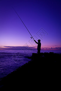 晚上西班牙加那利岛Tenerife太阳赛的渔民地平线黑色的图片