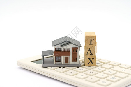 房地产税纸信用您的作背景商业概念和财务并有文本或设计复制空间的算器当年薪酬度收入TAX用于文字或设计的算器背景
