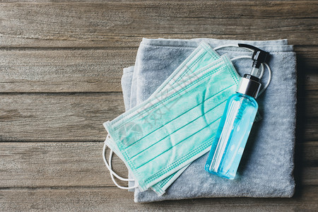治疗闪耀2019年预防冠状COVID19的酒精洗手胶和卫生面具消毒剂图片