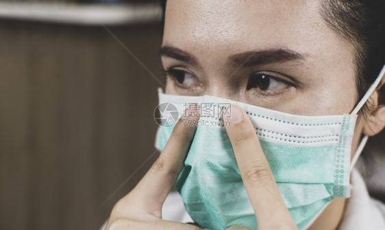 流感戴防染和止科罗纳传播的医疗面具亚裔女病人Covid19预防疾病喷嚏女士图片