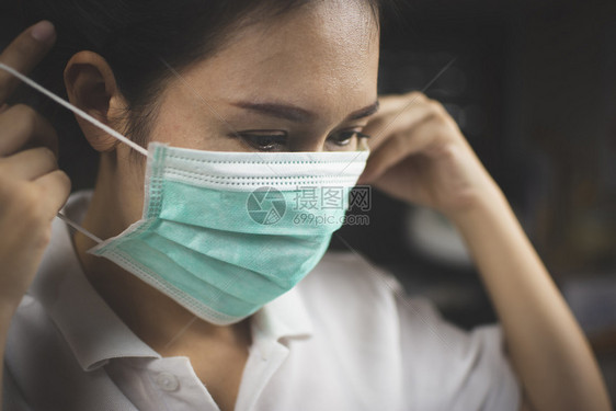 戴防感染和止科罗纳传播的医疗面具亚裔女病人Covid19预防疾病女士健康污染图片