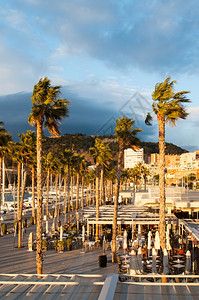 如画西班牙安达卢亚海岸城市马拉加太阳海岸日落时的照片塔溶胶图片